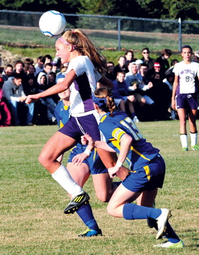 HEADS UP: Waterville’s Colleen O’Donnell heads the ball away from Hermon’s Maddie Page, right, during the Panthers’ 2-1 win over Hermon in the Eastern B final Wednesday in Waterville.