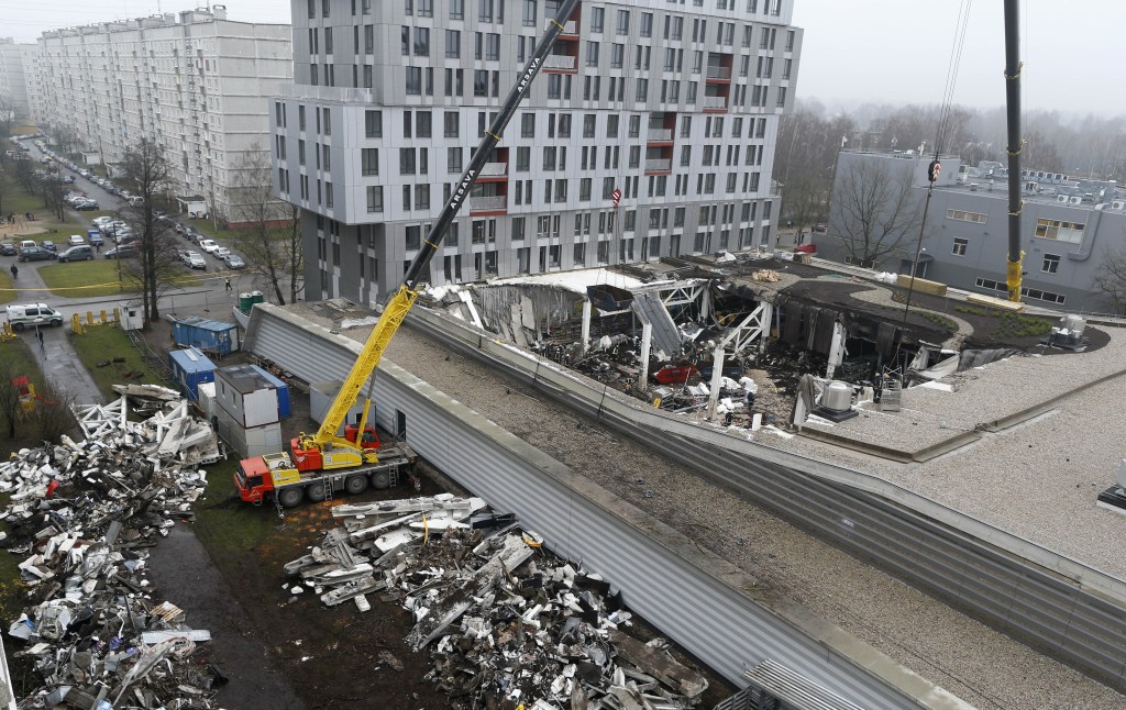 A view of collapsed Maxima supermarket in Riga, Latvia on Saturday. The roof fell Thursday evening in the Latvian capital of Riga as customers were doing after-work shopping.