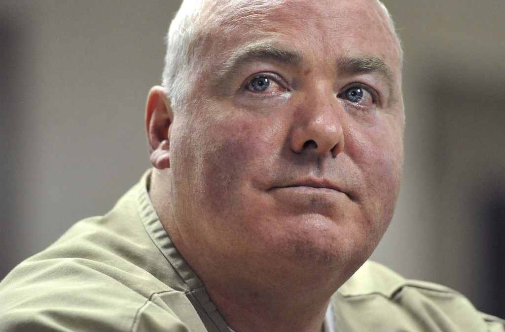 In this Oct. 24, 2012, photo, Michael Skakel listens during a parole hearing at McDougall-Walker Correctional Institution in Suffield, Conn.