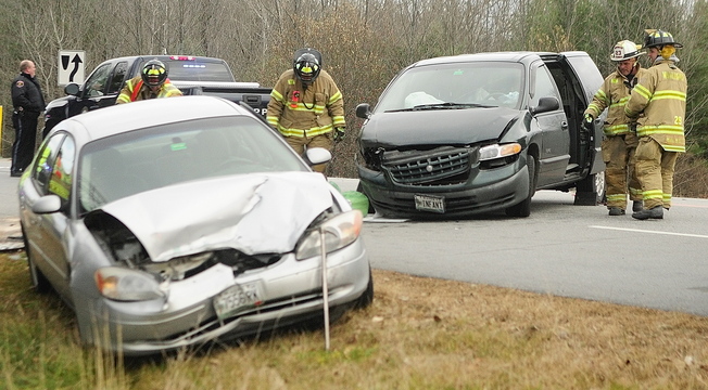 Winthrop emergency crews work at the scene of a two-vehicle collision on Tuesday November 19, 2013 at the corner of Pineland Lane and Route 202 in Winthrop.
