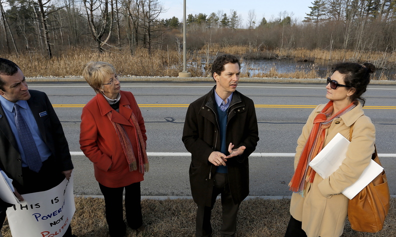 Maine Senate Ppresident Justin Alfond, center, addresses the media at the site of the proposed DHHS offices in South Portland. Alfond said he thinks the move is part of Gov. Paul LePage’s plan to make it more difficult for poor people to get needed services.