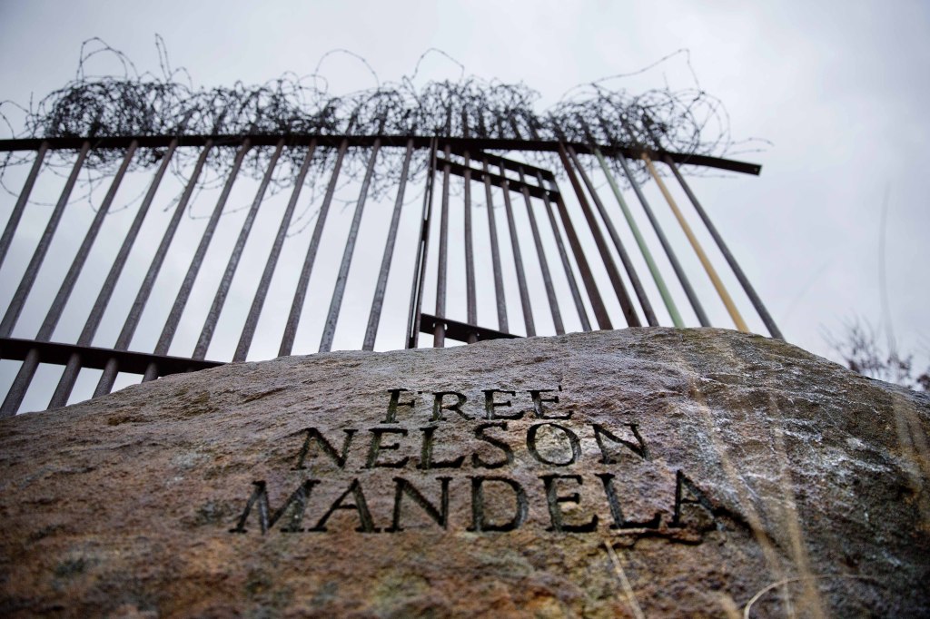 A monument to former president of South South Africa Nelson Mandela stands in Piedmont Park, Thursday, Dec. 5, 2013, in Atlanta. Mandela, the first black South African to hold the office, has died at age 95.