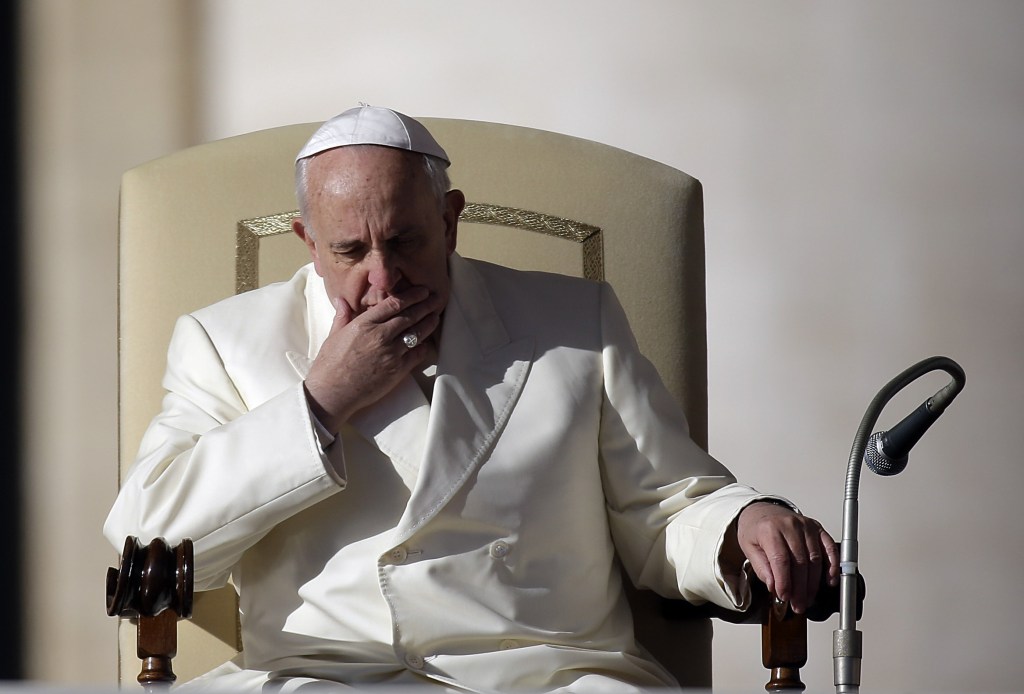 Pope Francis attends his weekly general audience in St. Peter’s Square at the Vatican on Wednesday.