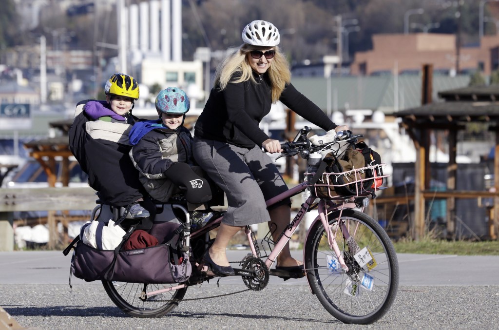 People in the Pacific Northwest are pushing the limits of what they can carry using so-called cargo bikes, shuttling children, groceries, fish and kegs of beer. AP Photo