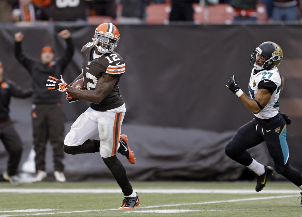 Cleveland Browns wide receiver Josh Gordon outruns Jacksonville Jaguars cornerback Dwayne Gratz on a 95-yard touchdown reception in the fourth quarter of a game on Sunday in Cleveland.