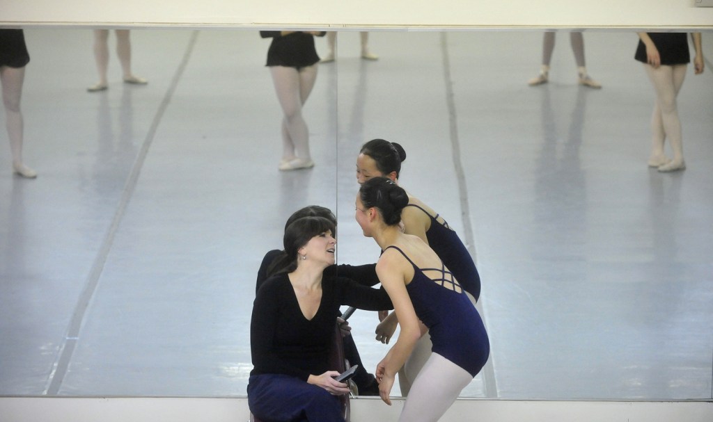 BOSSOV BALLET: Natalya Getman, left, shares a moment with Maine Central Institue sophomore Diyun Wang, 16, during a rehearsal for “The Nutcracker” last week. The Bossov Ballet Theatre is now a part of the Pittsfield school. Getman is the company’s new artistic director, succeeding Andrei Bossov.