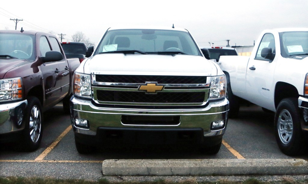 Chevrolet Silverado pickup trucks are seen on a dealer’s lot in Troy, Mich., on Monday. GM expects sales of pickup trucks to increase now that the government has shed its stock.