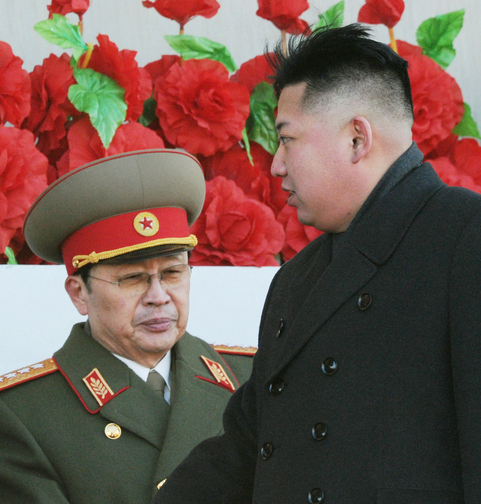 In this Feb. 16, 2012 photo, North Korean leader Kim Jong Un walks past his uncle Jang Song Thaek, left, after reviewing a parade of thousands of soldiers and commemorating the 70th birthday of the late Kim Jong Il in Pyongyang, North Korea. North Korea announced Monday, Dec. 9, 2013 it had sacked leader Jang, long considered the country’s No. 2 power, saying corruption, drug use, gambling, womanizing and generally leading a “dissolute and depraved life” had caused Pyongyang’s highest-profile fall from grace since Kim took power two years ago.