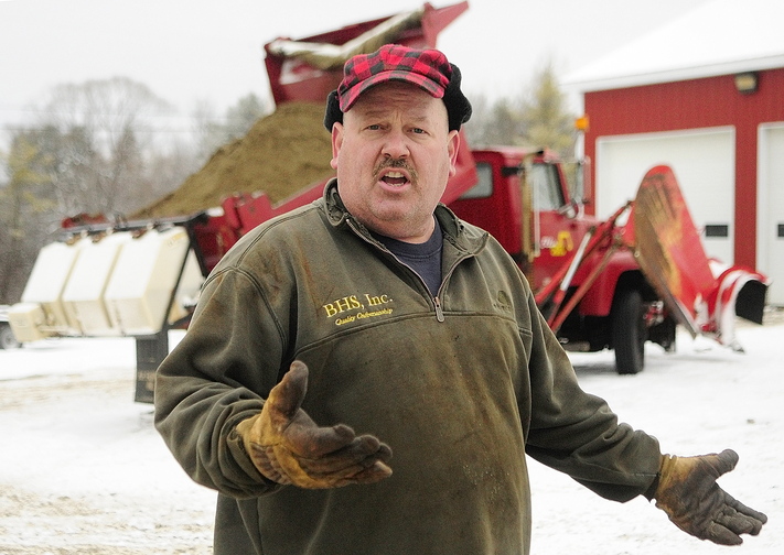 Contracted: Chris Ellis talks about the calcium chloride dispensers on his plow trucks on Tuesday.