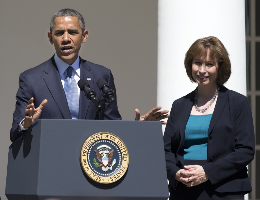 In this June 4, 2013 file photo, President Barack Obama gestures while speaking in the Rose Garden of the White House in Washington, Tuesday, June 4, 2013, to announce the judicial nominations including Patricia Ann Millett, right, to the U.S. Court of Appeals for the District of Columbia Circuit.