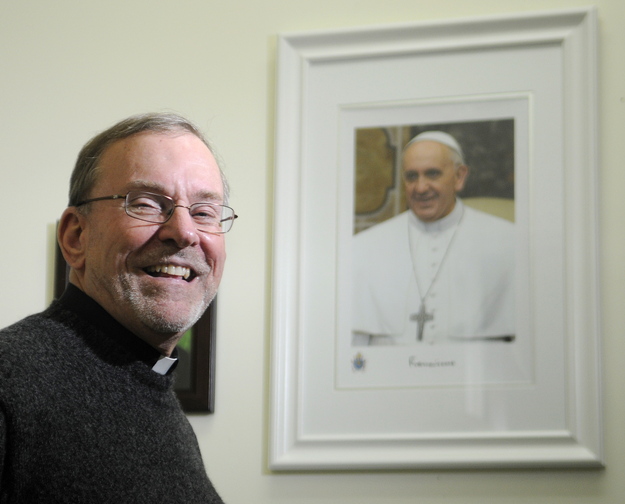 Committed: The Rev. Francis Morin, the administrator of St. Michael Catholic Parish in Augusta, said he is excited by the recognition Pope Francis has generated because of his commitment to social justice. The pontiff was named Time magazine’s Person of the Year.