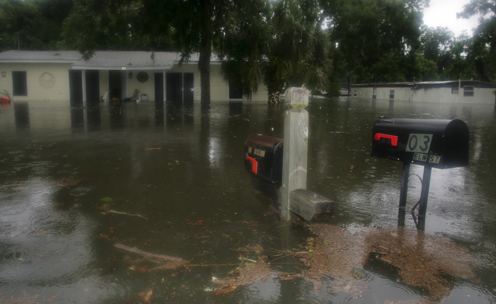 Homeowners in Live Oak, Fla., who endured flooding last year after a tropical storm are among millions in the U.S. facing higher premiums on required federal flood insurance.