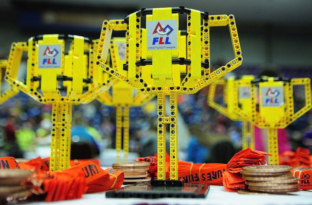 MEMENTOES: The trophies are made of LEGO at Maine’s FIRST® LEGO® League Championship at the Augusta Civic Center on Saturday.
