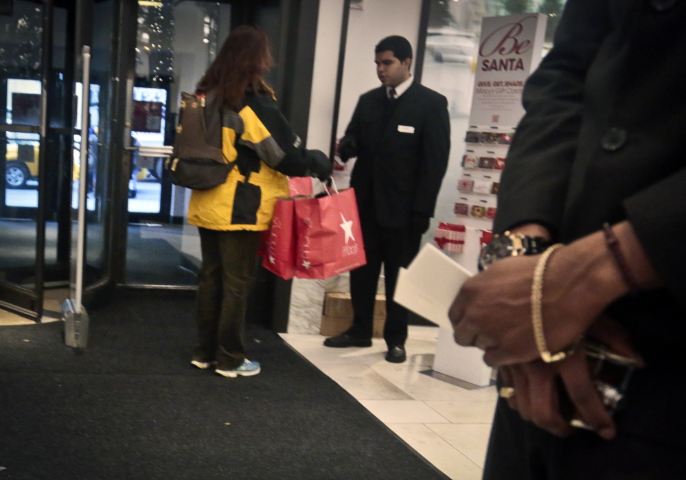 A security agent checks the bags of a shopper at Macy's in New York. Claims of racial profiling at department stores in New York have helped expose the practice in more than 40 states of retailers holding shoplifting suspects and assessing fines, even if a person hasn’t yet technically stolen anything. At Macy’s flagship store, suspects are held in cells, asked to sign an admission of guilt and pay hundreds in fines.