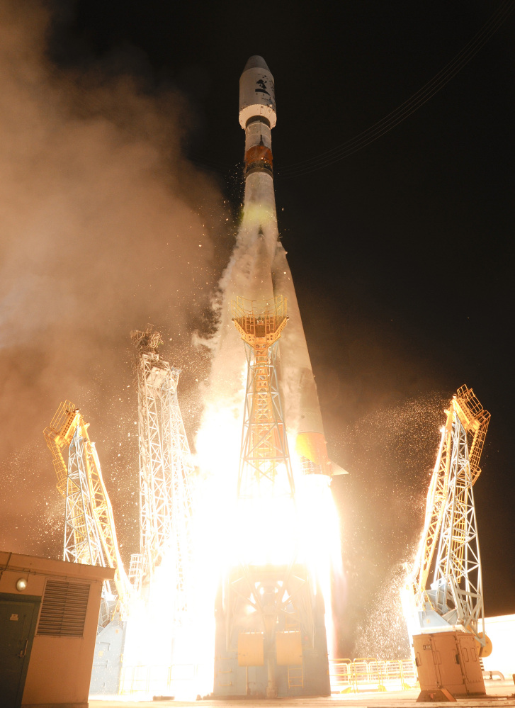 A Soyuz rocket carrying a European Space Agency satellite taking off from the Kourou space base, French Guiana, Thursday Dec.19, 2013. AP Photo