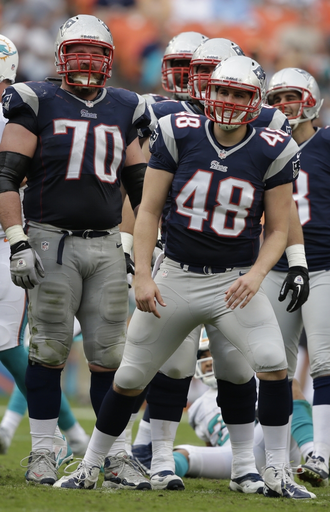 MOVING OVER: Logan Mankins (70) will likely move from left tackle to left guard when the New England Patriots play the Baltimore Ravens on Sunday. Mankins is filling in for the injured Nate Solder.