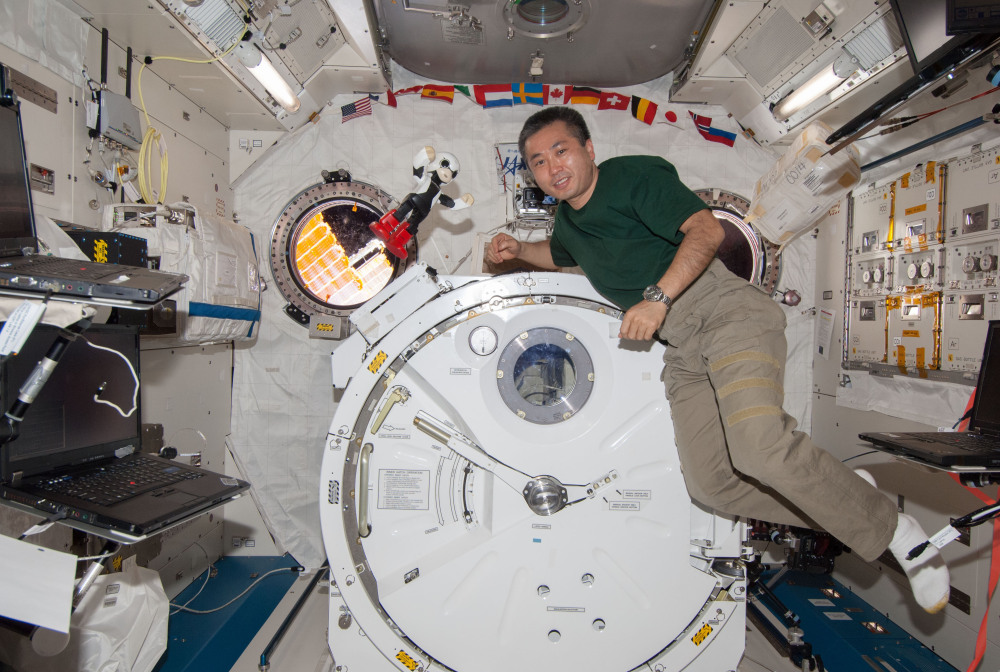 Kirobo and Japanese astronaut Koichi Wakata pose for a photo as they make small talk in Japanese at the International Space Station. The talks are part of an experiment testing the robot’s autonomous conversation functions.