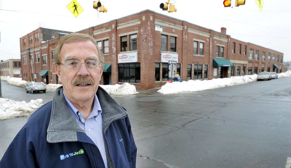 Developer Tom Toye stands in front of one of two Portland buildings on Lancaster Street that he owns and is offering to lease to the state Department of Health and Human Services.