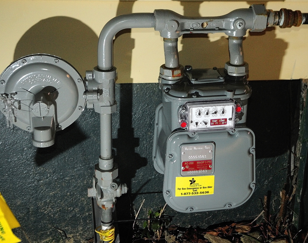 HEATING WITH GAS: an outdoor gas meter on the Augusta home of Dick Gagnon, who was one of the first in the area to switch from propane to natural gas.