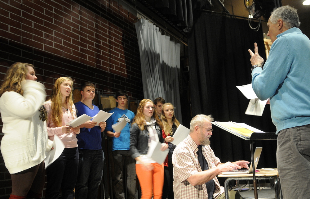 WICKED GOOD: Larry Morissette, right, directs choral students at Hall-Dale High School in Farmingdale as Stan Keach, center, of Rome, records the group singing his songs.