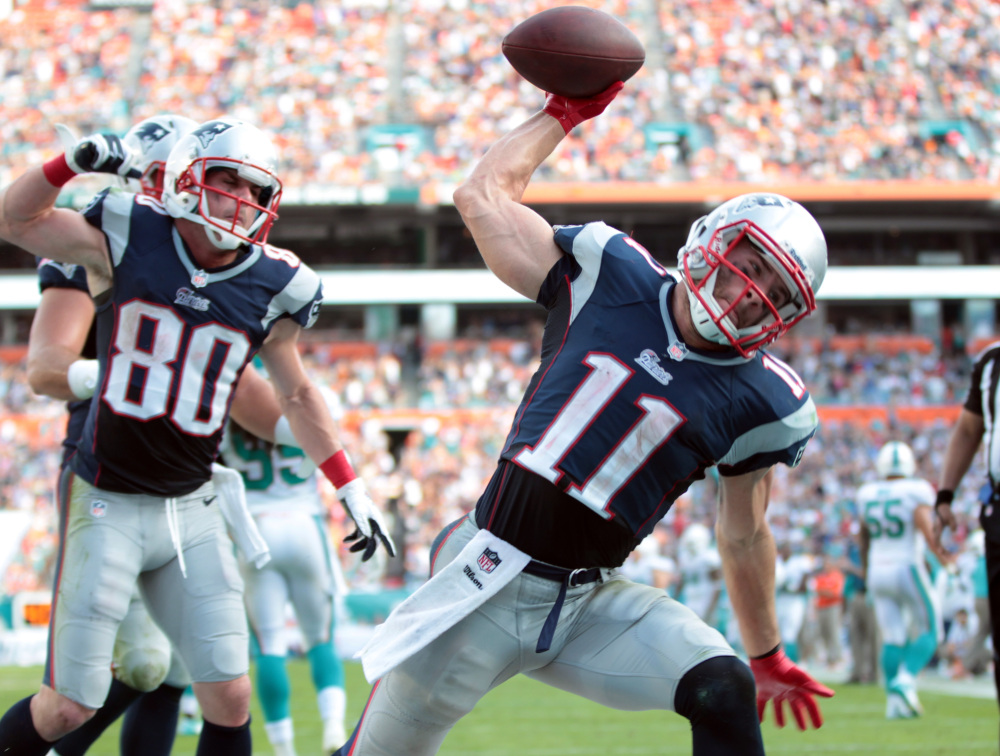 SPIKE THAT: New England Patriots wide receiver Julian Edelman (11) has 89 receptions this season, 20 more than his first four season combined. Edelman and the Patriots face Baltimore and will clinch the AFC East title with a win.