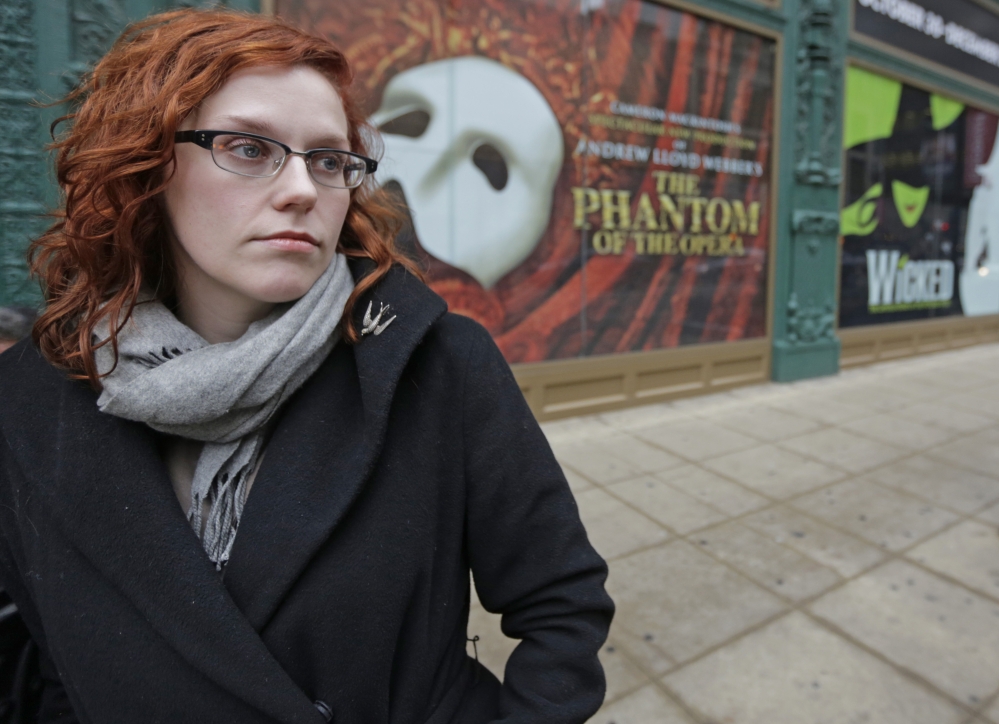 Actor Adrienne Matzen poses in Chicago’s theater district. Matzen, 29, who has been mostly uninsured since she turned 21, is now looking for a low monthly premium insurance plan on the federal website. High deductibles for health plans available on the Illinois insurance exchange may contribute to sticker shock when people start paying medical bills in 2014, if they have elected to pay for insurance under the Affordable Care Act.