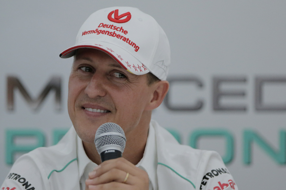 Seven-time Formula One champion Michael Schumacher was hospitalized with a head injury Sunday, after a skiing accident in the French Alps, French authorities and his manager said. The French Mountain Gendarmerie said Schumacher was wearing a helmet when he had a hard fall at the Meribel resort and that he sustained a “relatively serious” head injury. (AP Photo/Itsuo Inouye, file)