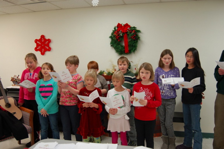 Students in the Maine French Heritage Learning Program recently sang Christmas carols at Chateau Cushnoc in Augusta. Front, from left, are Morgan Bersani, Jasmine Day, Phoebe Norman, Chloe Schueman, Alina Schueman and Allison Foust, and back, from left, are Andrew Fortunato, Jackson Tirrell, Hannah Foust and Sarah Foust. The students sang holiday classics such as “Oh Christmas Tree” and “Jingle Bells” in French and other songs.