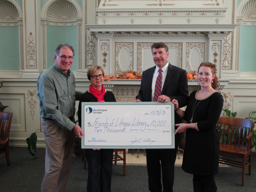 Skowhegan Savings has awarded a $10,000 gift to Friends of Lithgow Library, Inc., an organization that supports Augusta’s historic Lithgow Public Library and Reading Room. Its latest campaign is to fund, along with the city of Augusta, a renovation and expansion project that will preserve the 1896-structure and include the construction of an addition that will more than double the library’s functional space, with additional space for children’s reading and learning activities as well as a dedicated space for teens. From left are Wick Johnson, co-chairman of the Capital Campaign; Elizabeth Pohl, library director; John Witherspoon, Skowhegan Savings president and chief executive officer; and Meghan Loubier, manager of the bank’s Augusta branch. The next Capital Campaign fundraiser will be a pie sale from 9 a.m. to 6 p.m. Thursday, Jan. 23, at the library. There will be a variety of homemade pies, including apple, pumpkin, pecan, chocolate cream and blueberry.