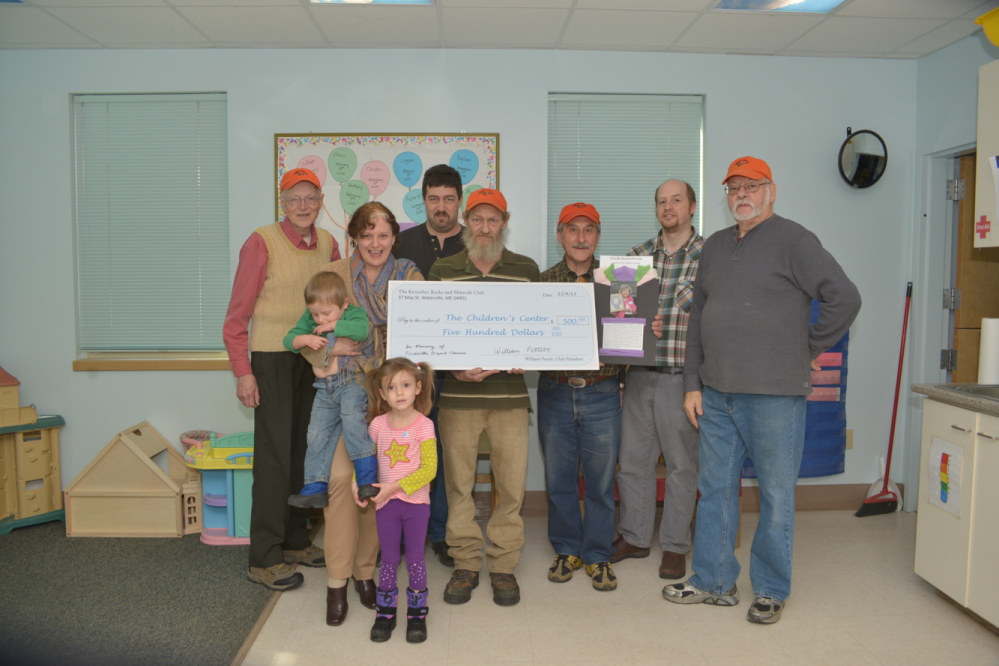The Kennebec Rocks and Minerals Club recently donated $500 to the Children’s Center in Augusta. From left are Vladimer Reneyske, club liaison; Elizabeth Barron, the center’s director of development; Paul Pinette, the club’s first vice president; Bill Pettitt, club president; Peter Serrada, club secretary; Stacy Morang, the club’s second vice president; and Ron LePage, club treasurer.