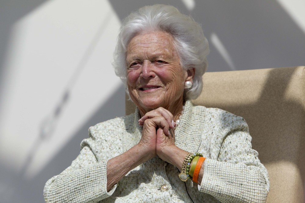 Former first lady Barbara Bush listens to a patient’s question during a visit to the Barbara Bush Children’s Hospital at Maine Medical Center in Portland in August.