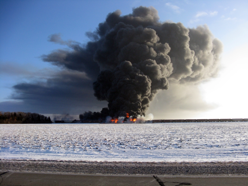 The Associated Press Smoke billows from a train derailment and fire west of Casselton, N.D., Monday.