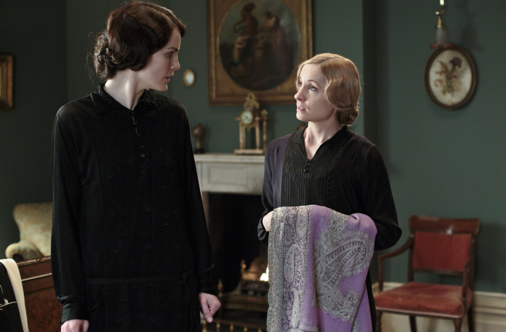 Michelle Dockery as Lady Mary, left, and Joanne Froggatt as Anna Bates appear in a scene from Season 4 of the Masterpiece TV series, “Downton Abbey.” Its much-awaited fourth season premieres Sunday.