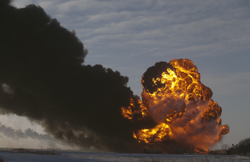 A fireball blooms as an oil train derails Monday in Casselton, N.D. The North Dakota accident is the fourth major derailment in North America in six months involving trains transporting a type of crude oil that safety officials said is more flammable and dangerous to ship by rail. Among other things, regulators called for better labeling and stronger tank cars.