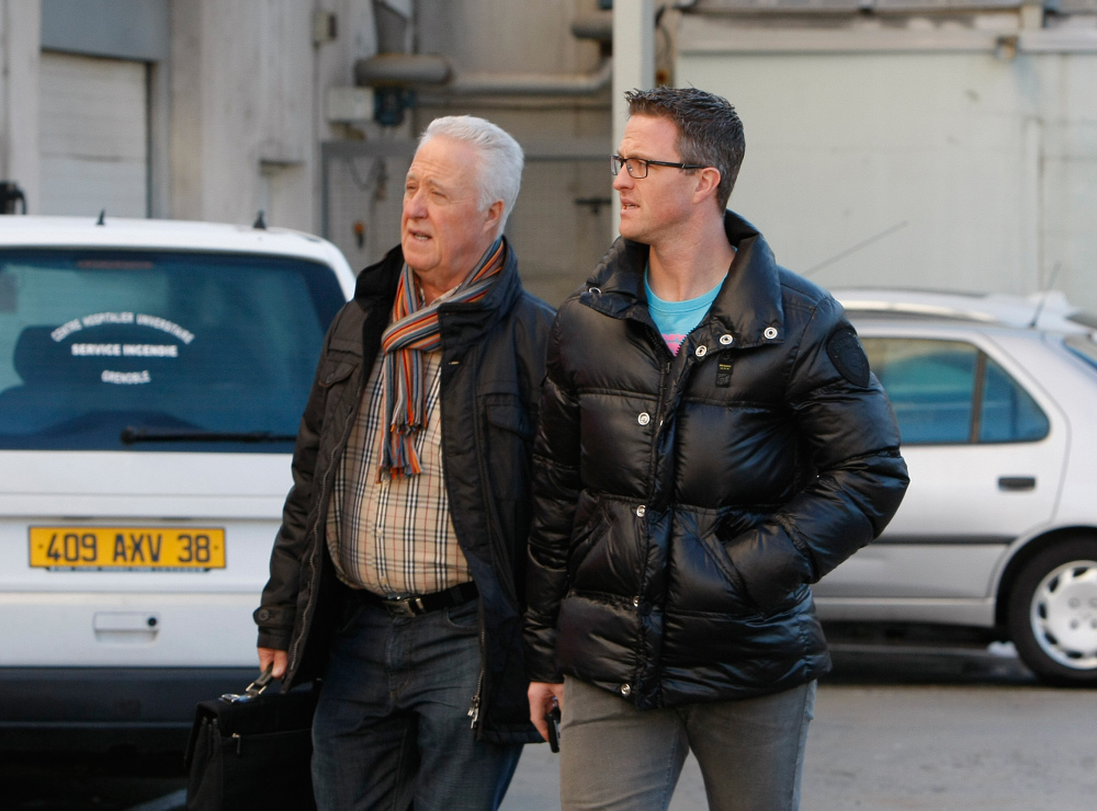 Michael Schumacher’s father Rolf, left, and brother Ralf arrive at Grenoble Hospital, French Alps on Sunday, where former seven-time Formula One champion Michael Schumacher is being treated after sustaining a head injury during a ski accident. Schumacher has been in a medically induced coma since Dec. 29 when he struck his head on a rock while on a family vacation.