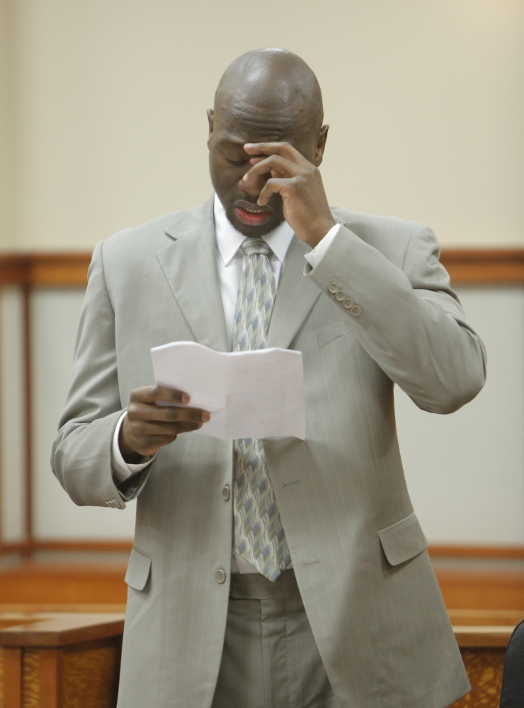 Eric Gwaro becomes emotional as he reads comments during his sentencing in Cumberland County Unified Criminal Court in Portland on Monday. During his comments, Gwaro apologized to Sherri York’s family members, who were in the courtroom, for his 2012 attack on York, which left her permanently impaired.