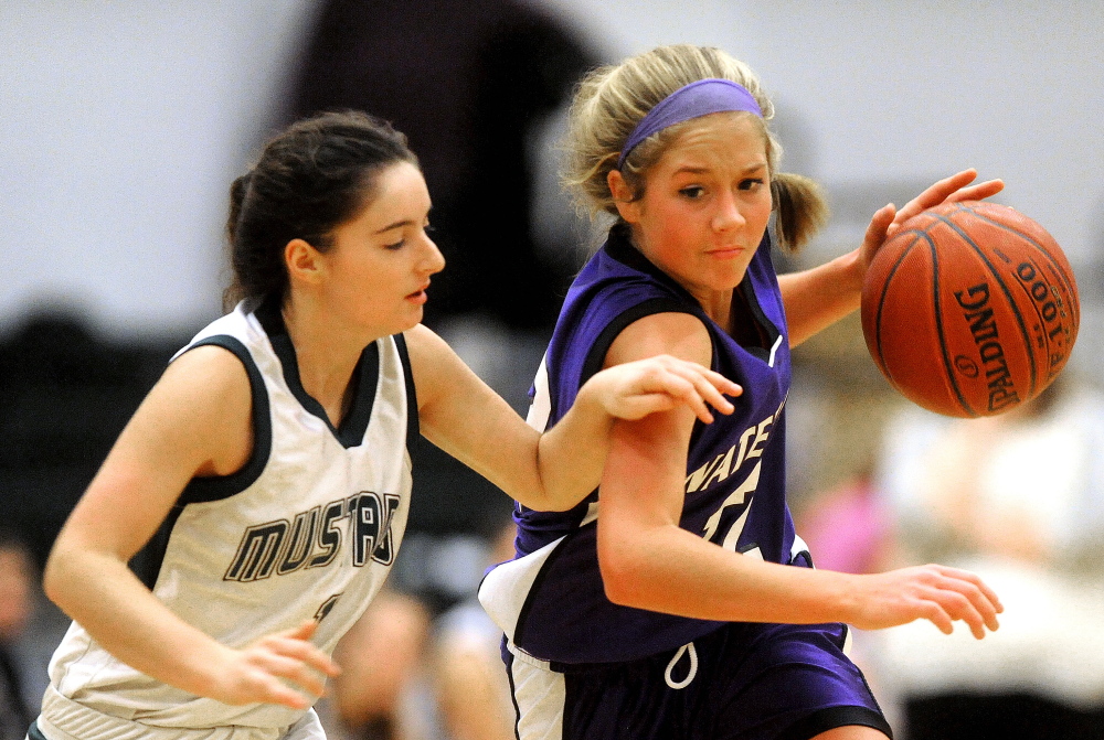 Staff photo by Michael G. Seamans ON THE WAY TO VICTORY: Mt. View’s Morgan Clifford, left, defends Waterville’s Colleen O’Donnell in the second half Tuesday at Mt. View High School in Thorndike. O’Donnell had 22 points and 12 steals and the Panthers won 53-39.