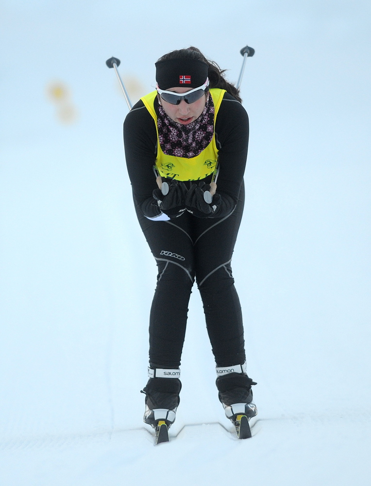 Staff photo by Michael G. Seamans COUGAR CLASSIC: Kents Hill High School's Aimee Sala tucks through the final stretch to finish second at the Cougar Classic nordic ski meet at Titcomb Mountain in Farmington on Wednesday.