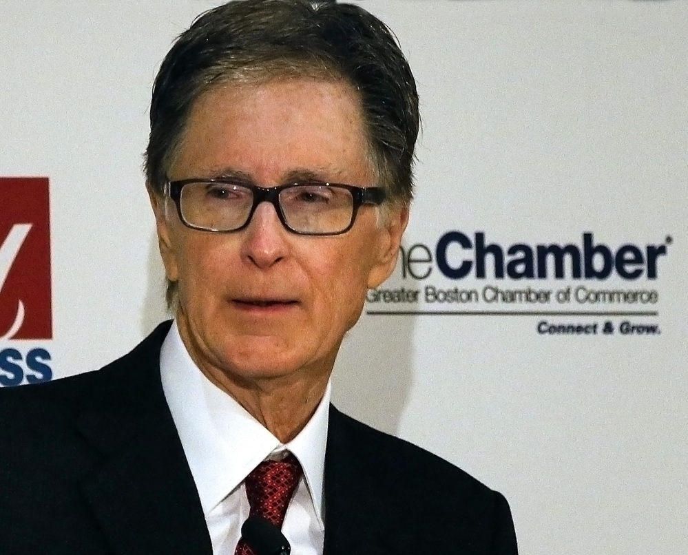 Boston Red Sox owner John Henry speaks at the Greater Boston Chamber of Commerce breakfast meeting at the Mandarin Oriental Hotel in Boston, Wednesday, Jan. 8 2014. Henry, who recently purchased The Boston Globe, said Wednesday at the breakfast that the newspaper would work to remain “aggressively relevant” in the changing media environment.