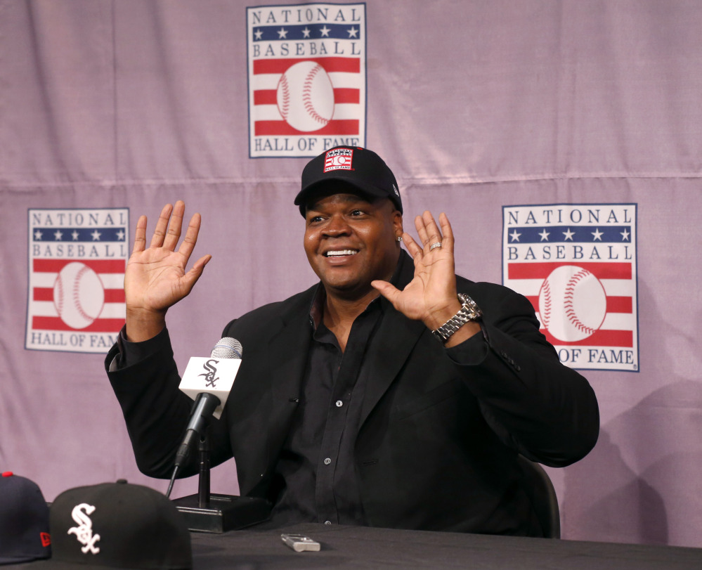 Chicago White Sox slugger Frank Thomas smiles as he responds to a question during a news conference about his selection into the MLB Baseball Hall Of Fame on Wednesday at U.S. Cellular Field in Chicago.
