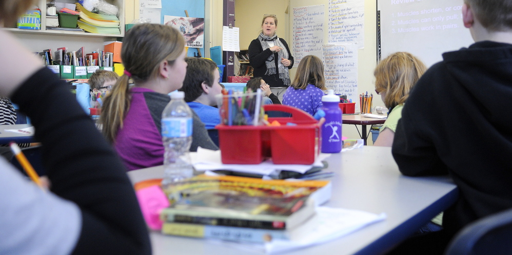 CRUNCH: Fourth grade teacher Sarah Hanley instructs Thursday in a room at the Helen Thompson School in West Gardiner that once served as the school’s art classroom.