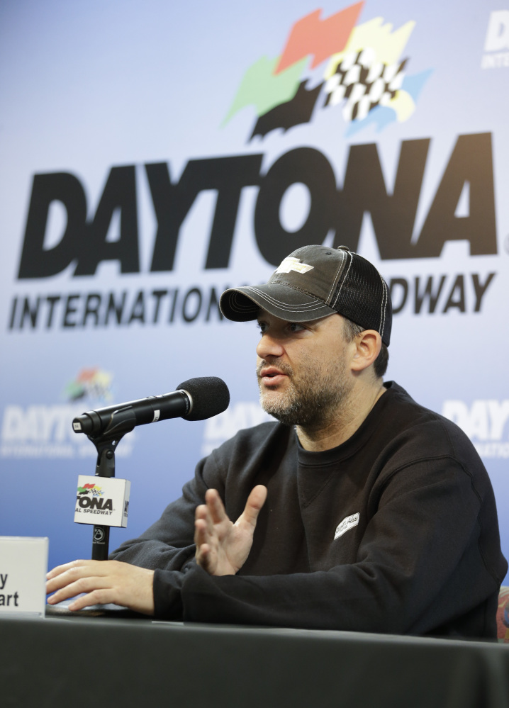 NASCAR driver Tony Stewart answers questions at a news conference during Sprint Cup auto racing testing at Daytona International Speedway in Daytona Beach, Fla., on Thursday.