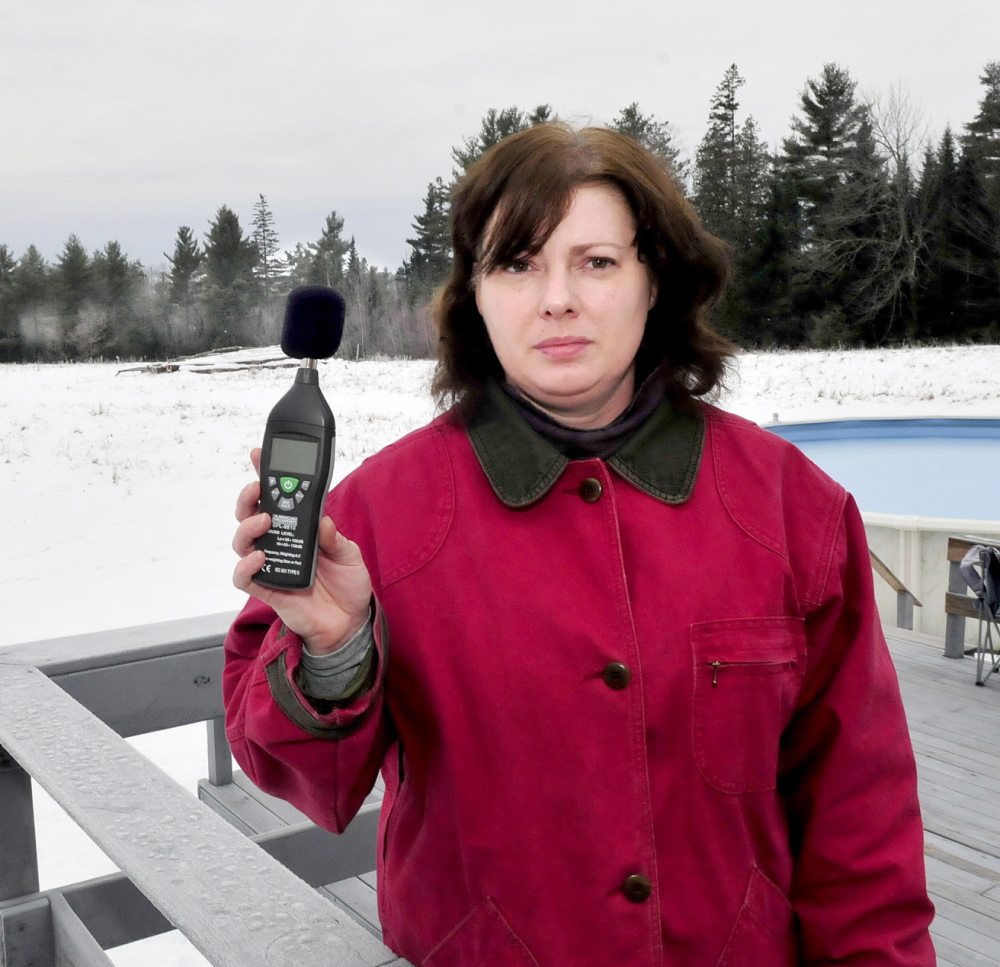 MAKING NOISE: Cherry Strohman says the buzz from a Central Maine Power near her Benton home is waking her and neighbors. The area residents are now using town-provided sound meters to measure the noise.