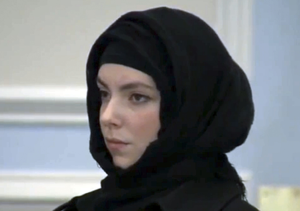 Katherine Russell, widow of Boston Marathon bombing suspect Tamerlan Tsarnaev, stands during a hearing in district court Thursday in Wrentham, Mass., on charges of driving with a suspended license, speeding and driving an unregistered motor vehicle in Franklin, Mass., in August.