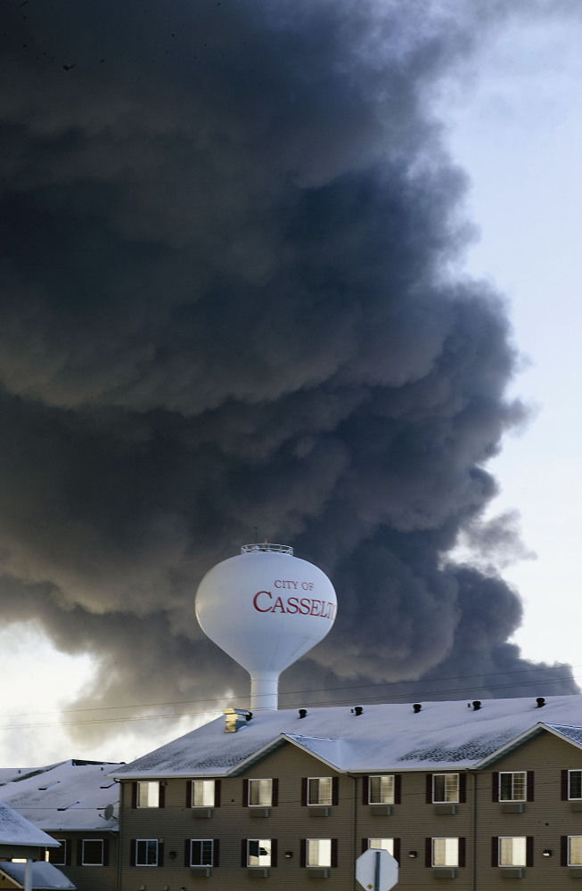 A fireball goes up at the site of an oil train derailment in Casselton, N.D., last month. Its cargo was a highly flammable crude oil from western North Dakota. Senators are pushing for action after a string of derailments.