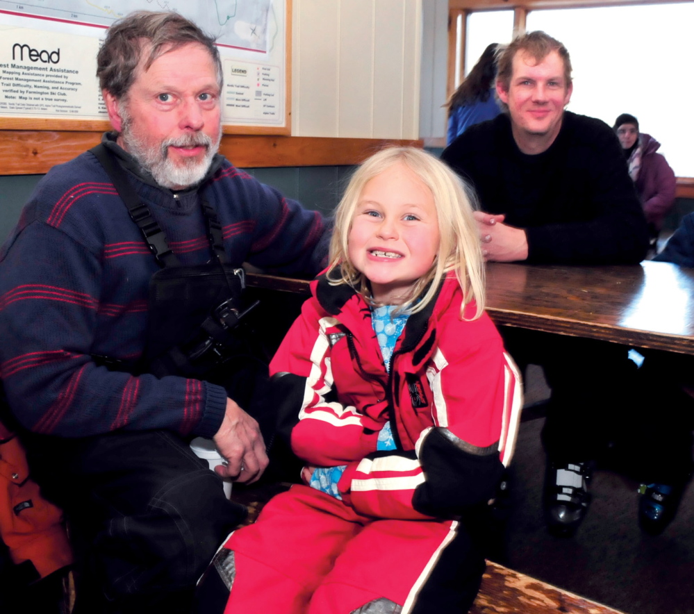 YEARS OF FUN: These patrons of Titcomb Mountain Ski Area in Farmington have nearly 100 years of combined experience at the popular facility. From left are Neal Yeaton who has skied for 58-years at Titcomb with his granddaughter Madie Morton, and Jody Farmer who has patronized Titcomb for 35-years.