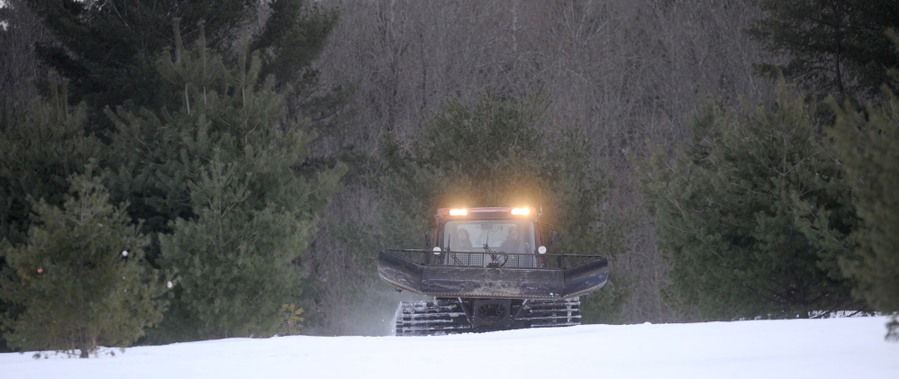 COLD JOBS: Steven Buzzell, the grounds mechanic for Waterville Parks and Recreation, grooms part of 7 miles of nordic ski trails at Quarry Road Recreational Area recently.