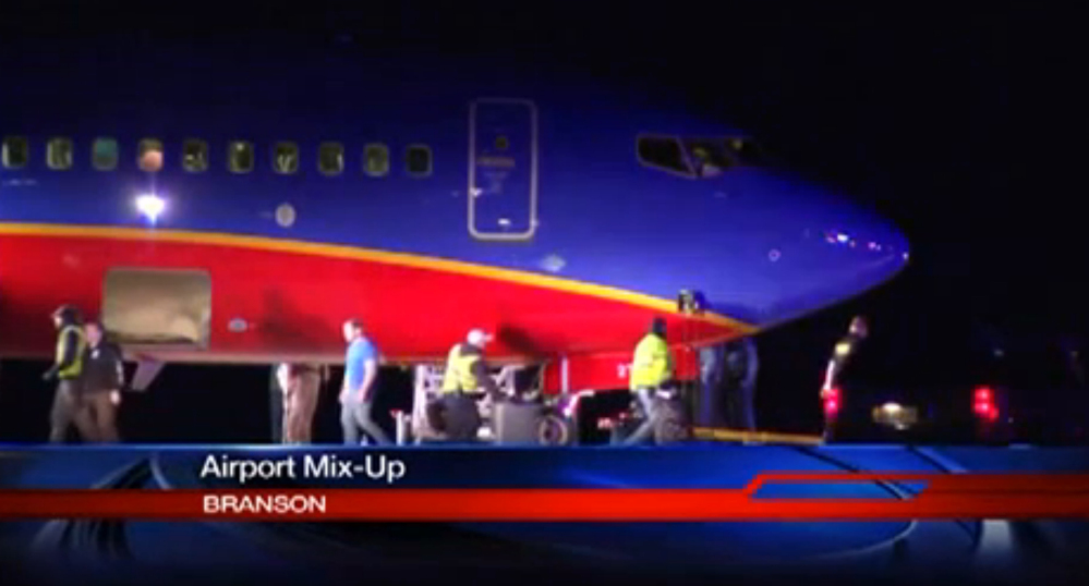 This frame grab provided by KSPR-TV shows a Southwest Airlines flight that was scheduled to arrive Sunday at Branson Airport in southwest Missouri but instead landed at an airport 7 miles north.