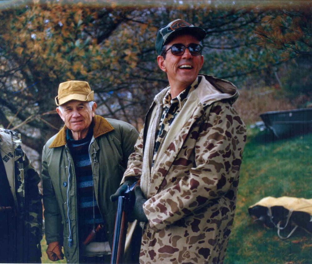 Source:L.L. Bean Archive Leon Gorman, right, grandson of L.L. Bean, and George Soule, left, a renowned craftsman of decoys, hunt on Lanes Island in the 1980s. A statewide group announced Monday that Gorman has donated the 28-acre, unoccupied island to be preserved for the public’s use.