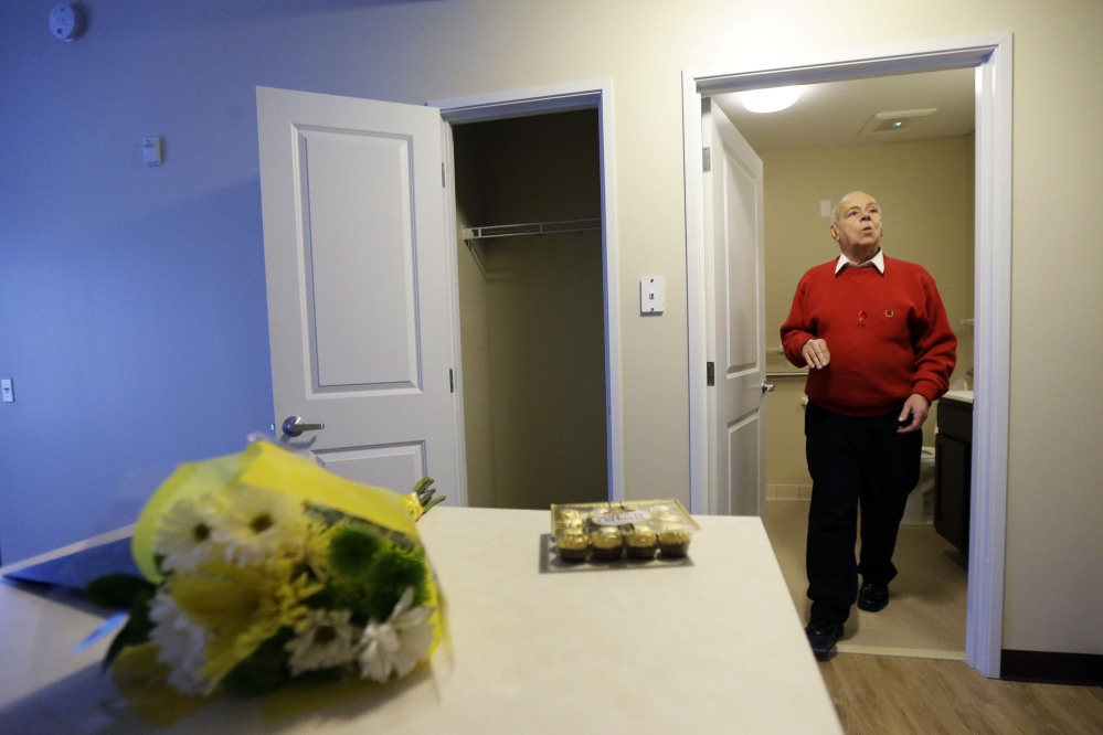 Jerry Zeft, 70, explores his new home in the John C. Anderson apartments, an affordable housing complex aimed at gay seniors in Philadelphia.